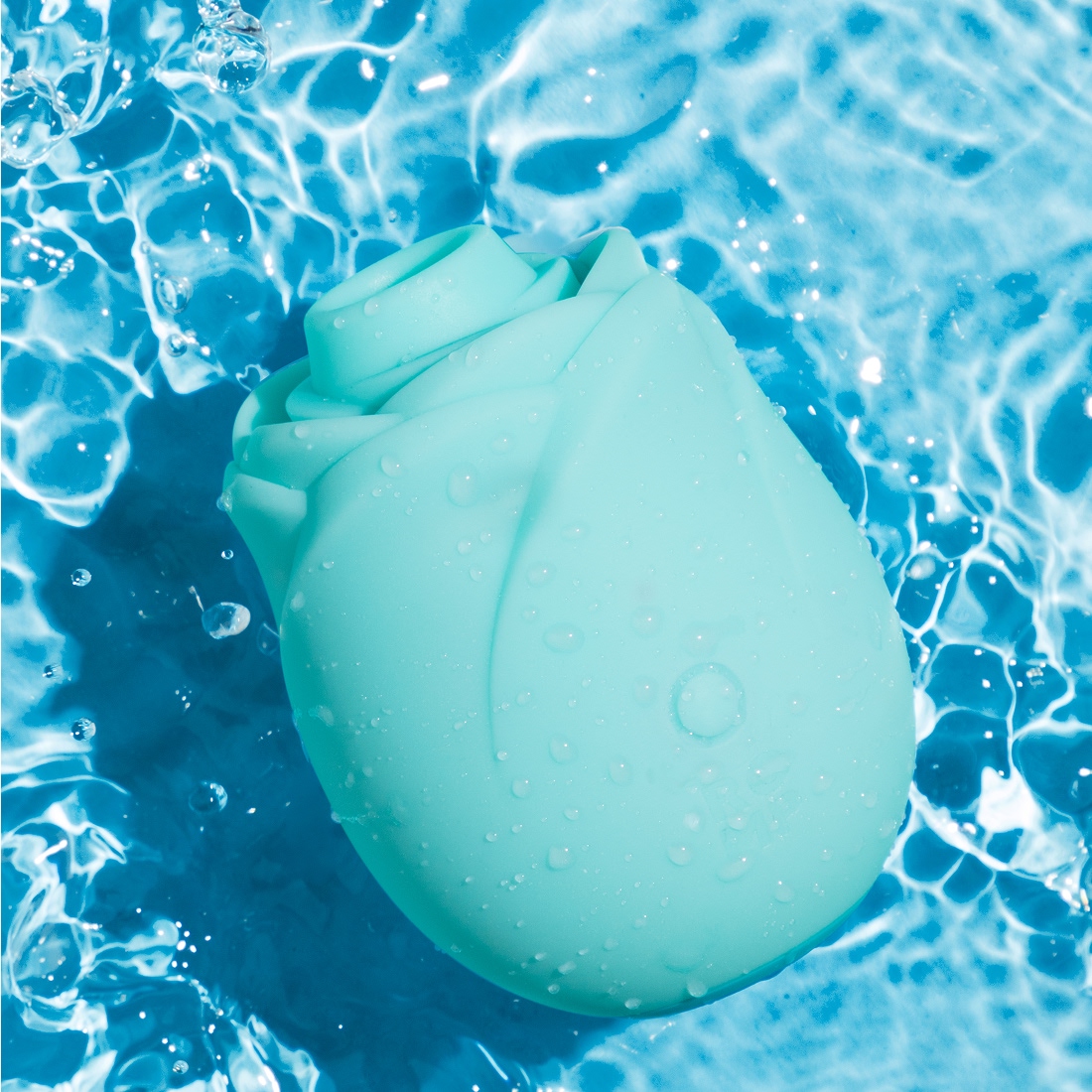 Romp by Womanizer Rose Glow bezdotykowy masażer łechtaczki świecący w ciemności