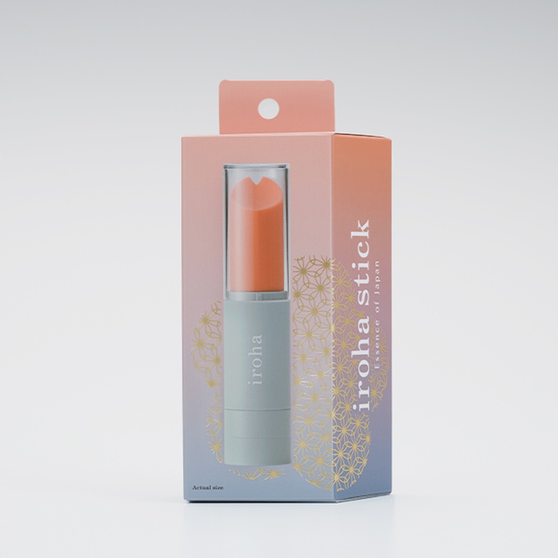Iroha Stick masażer w kształcie szminki koralowy - opakowanie produktu